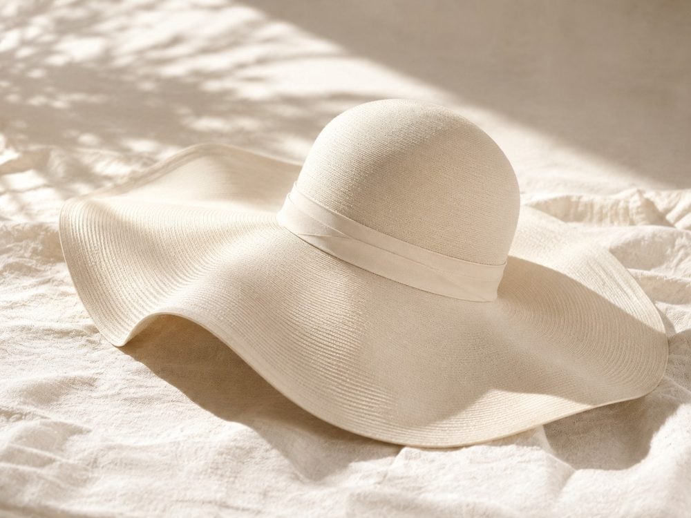 Wide-brim custom sun hat with embroidered logo on the brim